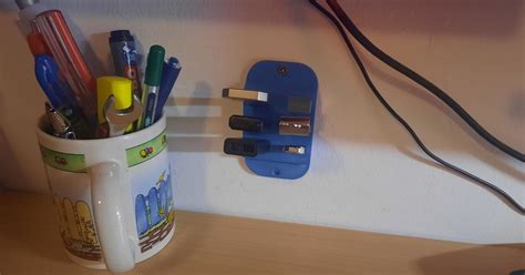 Wall mounted usb holder by Jonas.Neugebauer | Download free STL model | Printables.com