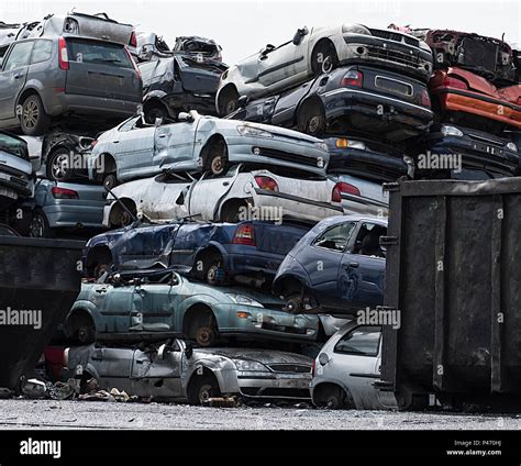 Piled up scrap cars hi-res stock photography and images - Alamy