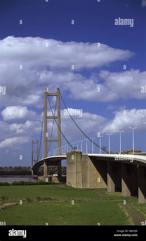 vehicles crossing the humber bridge spanning the humber estuary joining yorkshire with ...