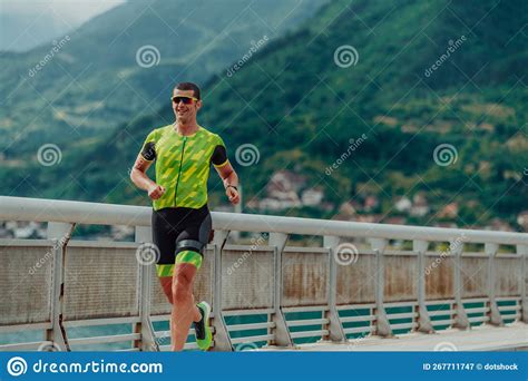 An Athlete Running a Marathon and Preparing for His Competition. Photo ...