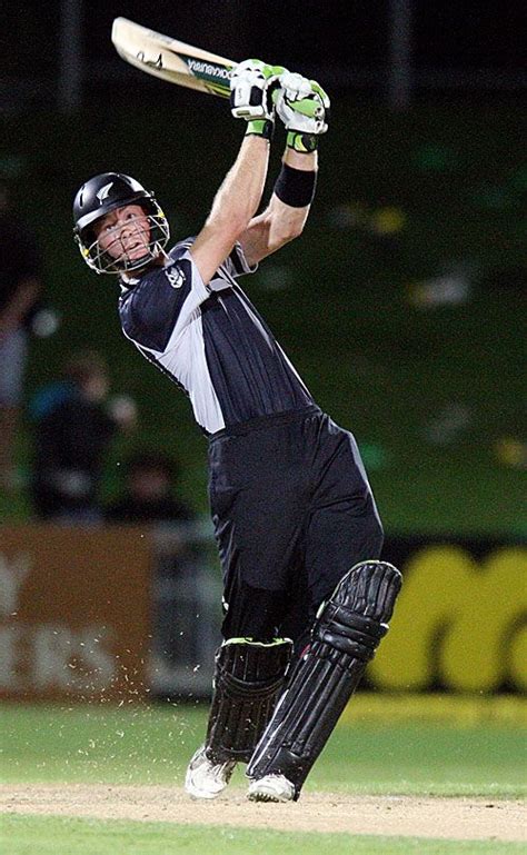 Martin Guptill lofts during his 64 | ESPNcricinfo.com