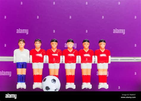 foosball table soccer football players sport teame Stock Photo - Alamy