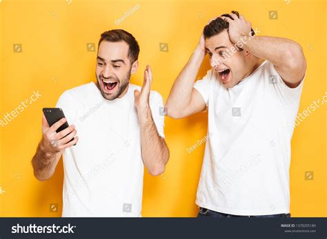 Two Cheerful Excited Men Friends Wearing Stock Photo 1378205189 ...