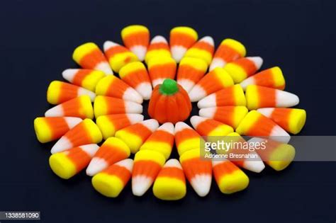 Candy Corn Black Background Photos and Premium High Res Pictures ...