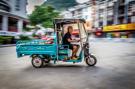 Tuk Tuk Driver, China | China travel photography, China, China travel