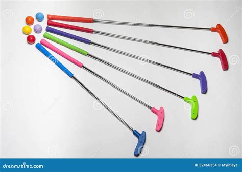 Brightly Colored Mini Golf Clubs And Balls Stock Images - Image: 32466354