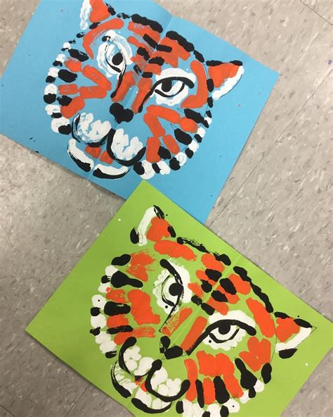 tiger face symmetry prints | Animal art projects, Elementary art projects, Kindergarten art