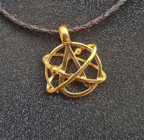 Scientific atheism symbol sign Star Dust, brass Yellow gold-plated polished 28x33x8.5 mm