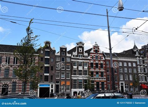 View on Slanting Canal Houses on Rokin Street in Amsterdam, Holland ...