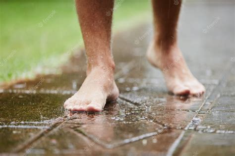 Premium Photo | Barefoot in rain