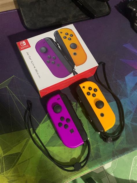 Nintendo Switch Neon Purple Orange Joycon, Video Gaming, Gaming ...