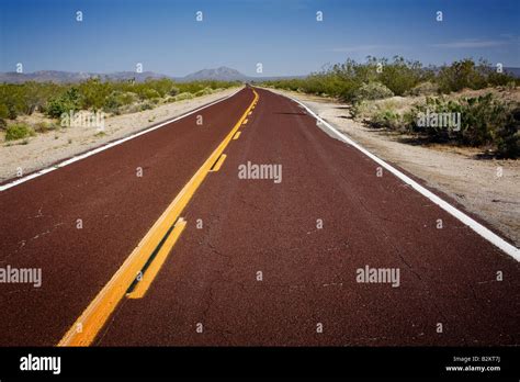 Red asphalt road in California United States Stock Photo - Alamy