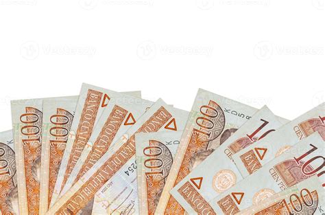 100 Dominican peso bills lies on bottom side of screen isolated on white background with copy ...