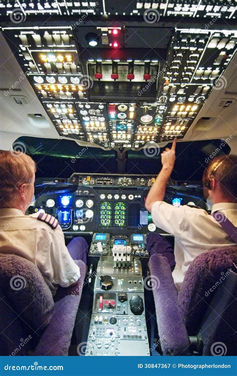 Two Pilots in Aeroplane Cockpit Editorial Photography - Illustration of ...