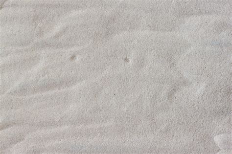 Premium Photo | White sand background. top view
