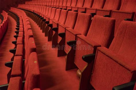 Red theater chairs stock photo. Image of indoor, show - 99886802