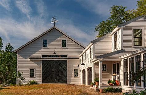 A historical New England farmhouse is restored to its former glory