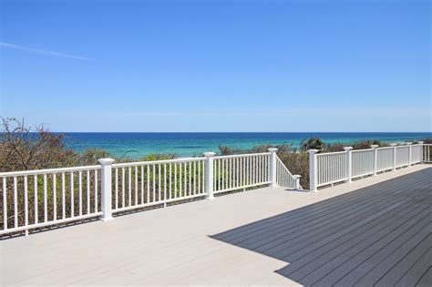 Deck with table and lounge chairs.