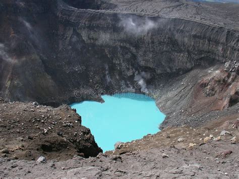 Crater lake of volcano stock photo. Image of mountains - 160453342