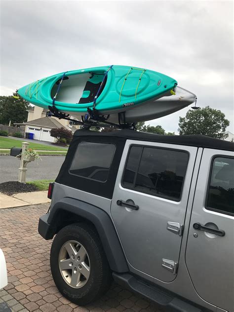 Jeep Wrangler with the Hitchmount-Rack System holding two kayaks. | Jeep wrangler camping, Jeep ...