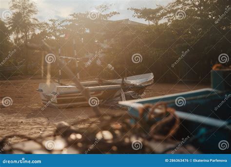 Old fishing boat at sunset stock photo. Image of wall - 286363476