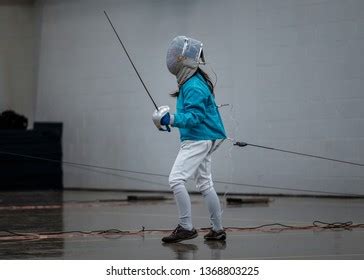 Young Girl En Garde Fencing Positiondark Stock Photo 1368803225 | Shutterstock