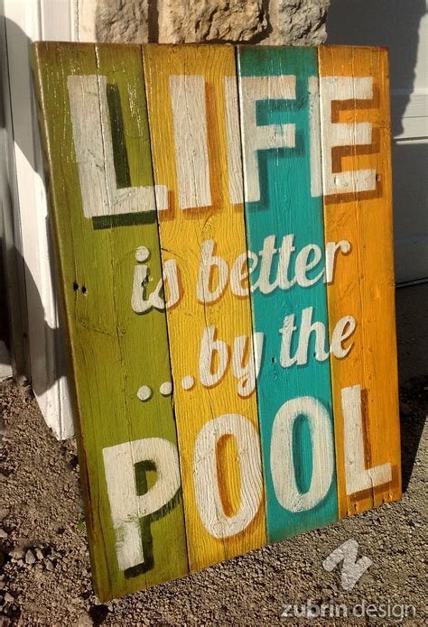 Hand made sign. "Life is better by the pool". Rustic, distressed ...