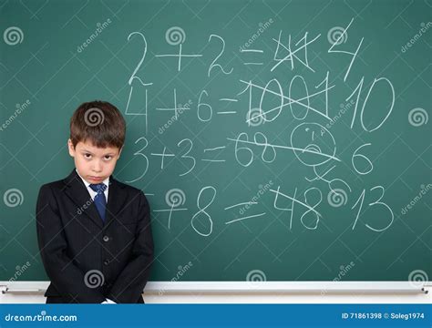 School Boy Decides Examples Math Wrong on Chalkboard Background ...