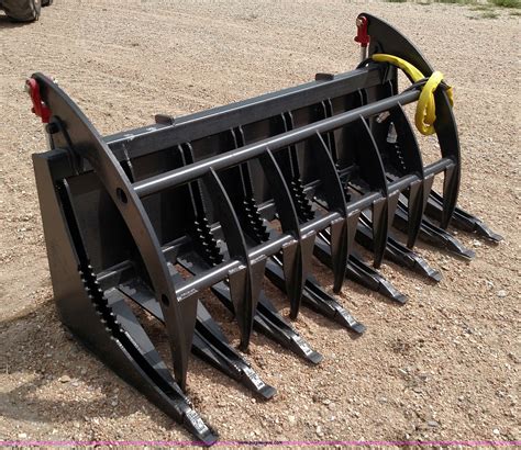 66" E-series root rake grapple in Newton, KS | Item F1769 sold | Purple Wave