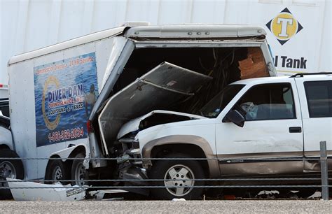 Wrecked cars, trucks await insurers