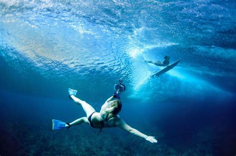 In pictures: Amazing images of surfer girls under Hawaiian waves ...