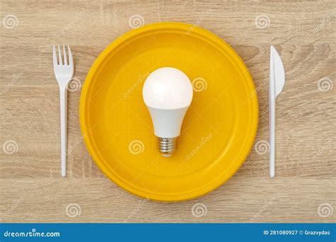 LED Light Bulb in a Disposable Plate Stock Image - Image of project, present: 281080927