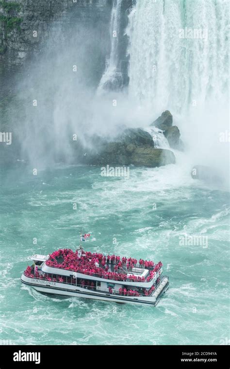 Canada, Ontario, Niagara Falls, boat tour in front of Niagara Falls ...