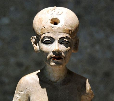 Small statuette of Nefertiti. In Neues Museum in Berlin, Germany. Old ...