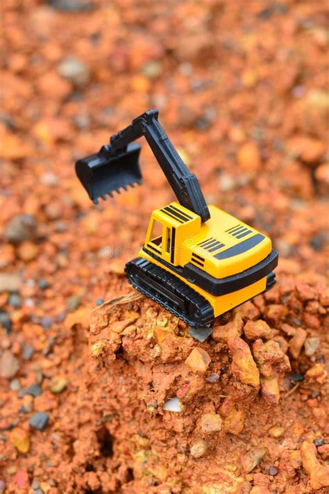 Excavator Toy Work at Construction Site Stock Photo - Image of mountains, pattern: 98548428