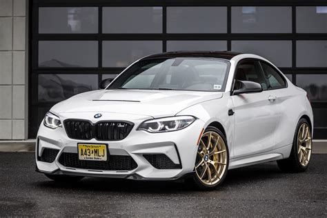 The 2021 BMW M2 CS painted in Alpine White and white gold wheels