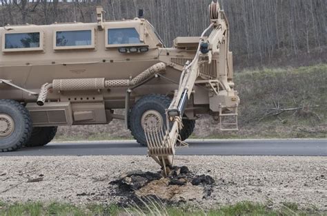 Buffalo mine-protected vehicle. Spc. Todd Thomas, combat engineer, 441st Engineer Company, Route ...