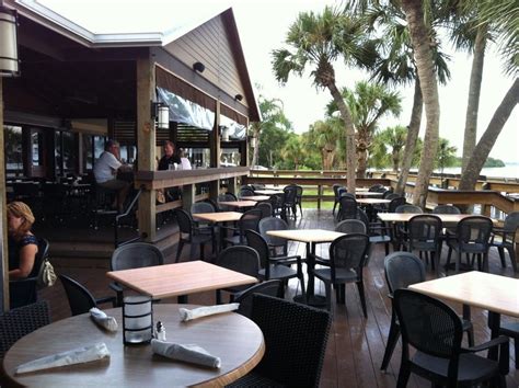 Photo of River Rocks Dining Dockside - Rockledge, FL, United States. Outside dining space ...