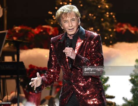 Singer Barry Manilow performs during A Very Berry Christmas presented... | Barry manilow, Barry ...