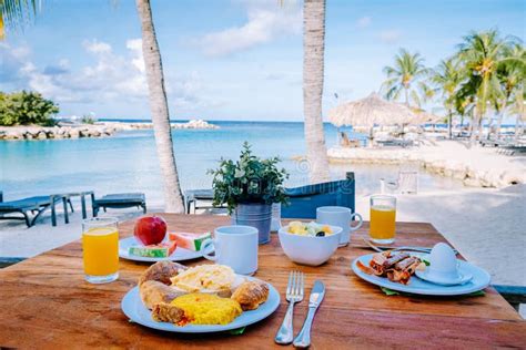 Breakfast on the Beach by the Pool with a Look Over the Ocean of La Digeu Seychelles Stock Image ...