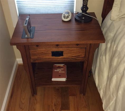 Solid Oak Nightstand Graces a Comfortable Bedroom