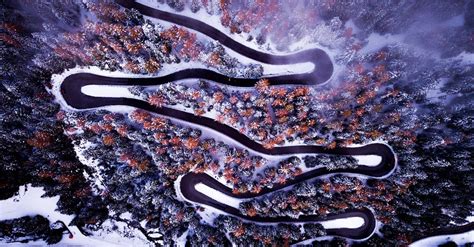 Drone Footage of Road on a Mountain Slope · Free Stock Photo