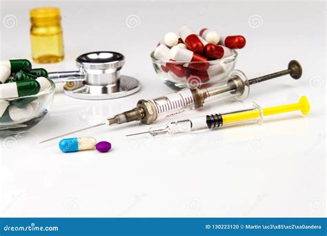 Assorted Medical Drugs and Syringe on White Background. Injection for ...