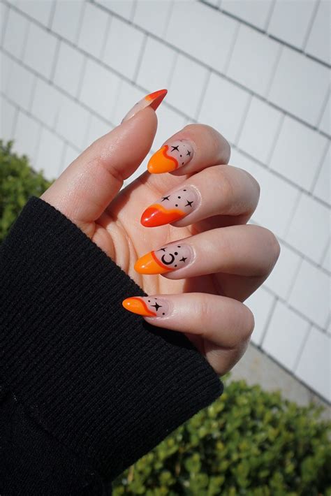 Manicure of the Month: Neon Orange Halloween Nails - living after midnite