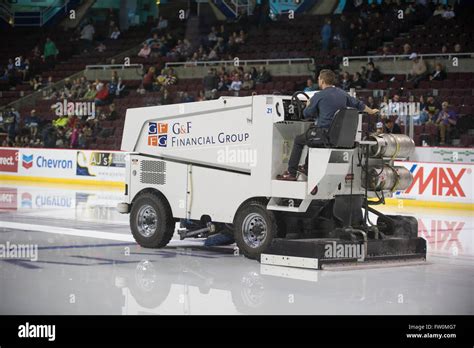 Zamboni ice resurfacing an ice rink Stock Photo, Royalty Free Image ...