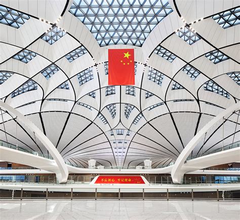 Zaha Hadid Architects' giant starfish-shaped airport opens in Beijing ...