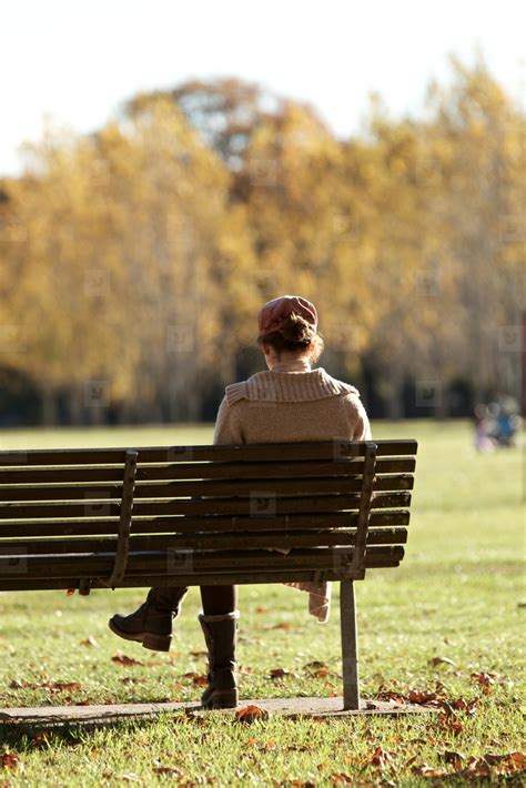 Women Sitting Alone Park Bench stock photo (35163) - YouWorkForThem