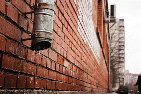 Black Tube On A Brick House Wall (drain Water) Stock Image - Image of joint, togetherness: 30499199