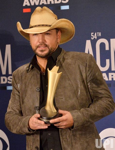 Photo: Jason Aldean wins award at the Academy of Country Music Awards ...