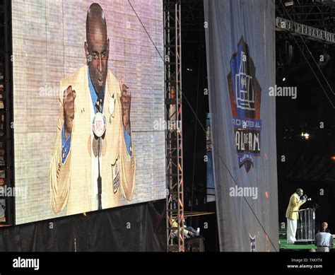 Deion Sanders delivers his induction speech during the Pro Football ...